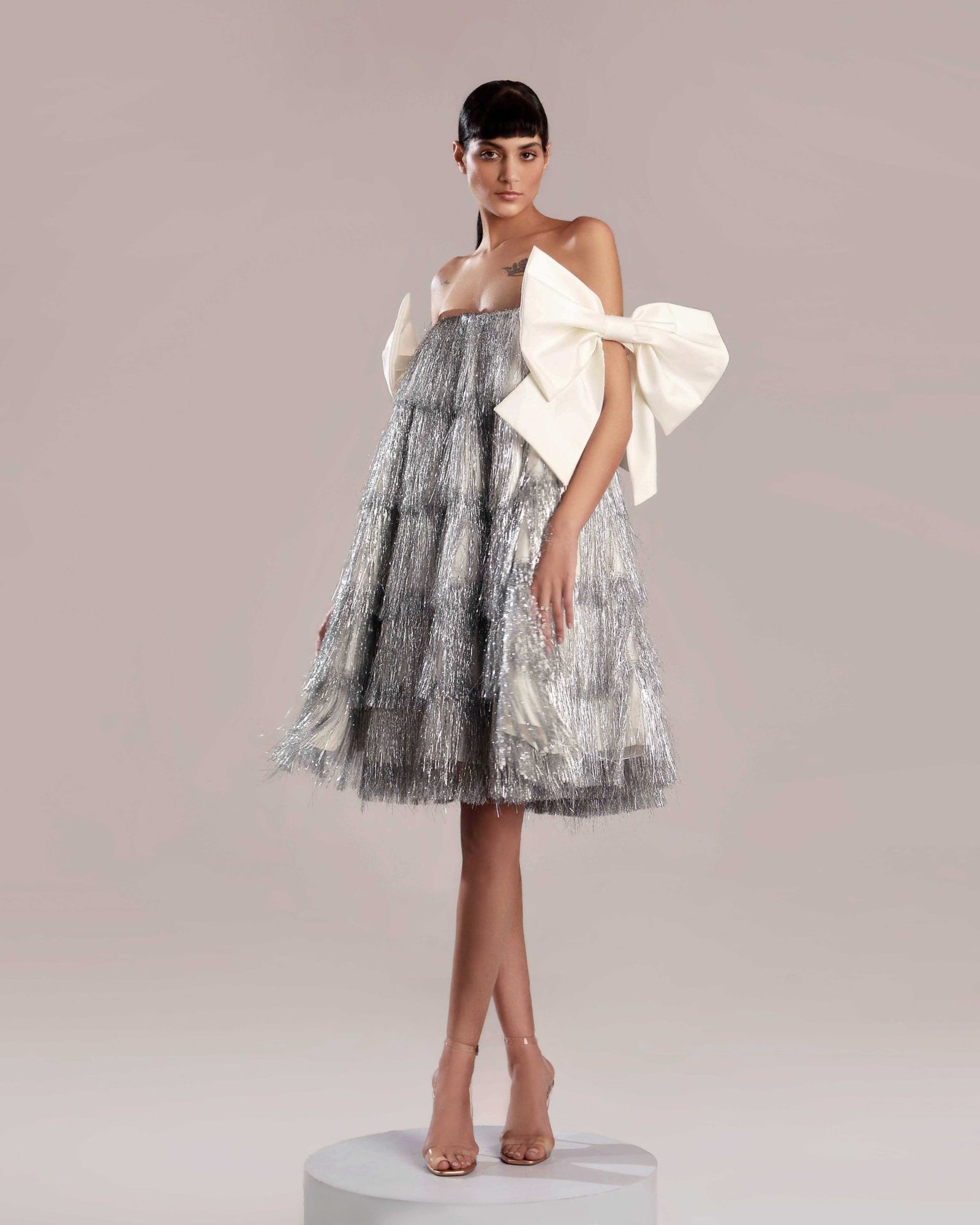 Whimsical Silver Feathered Dress with White Taffeta Bow Ties