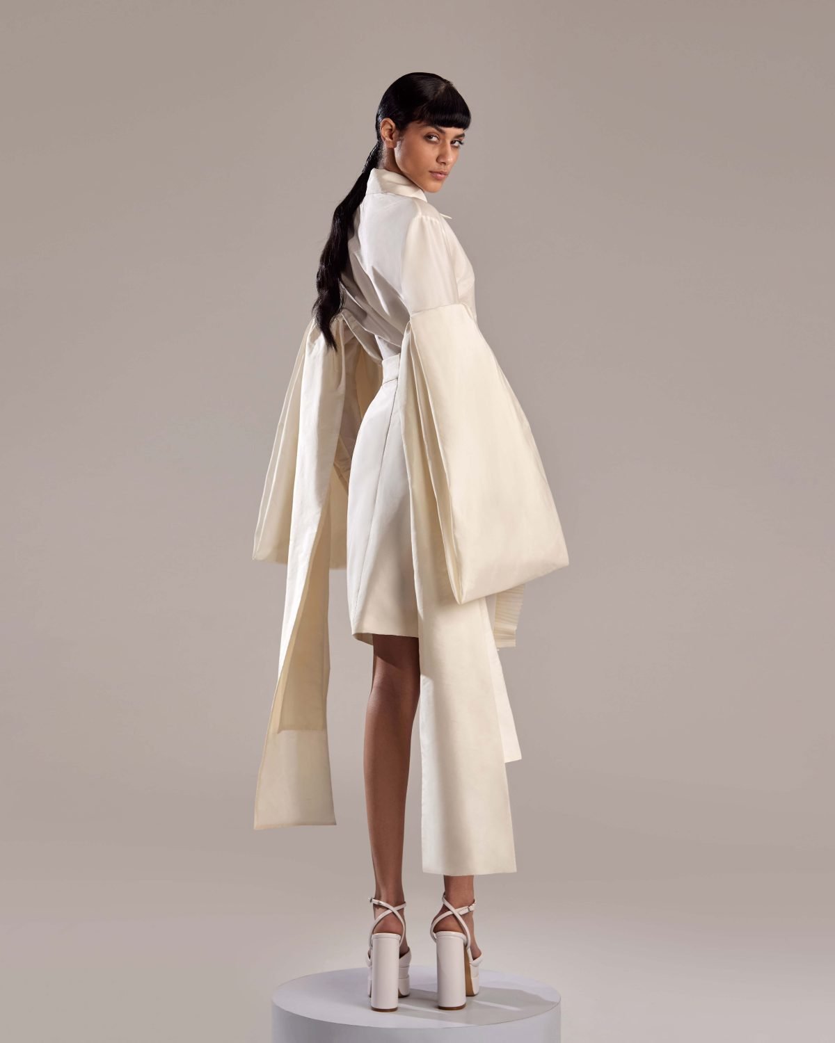 Luxurious White Taffeta Top with Unique Long-Sleeve Drapes