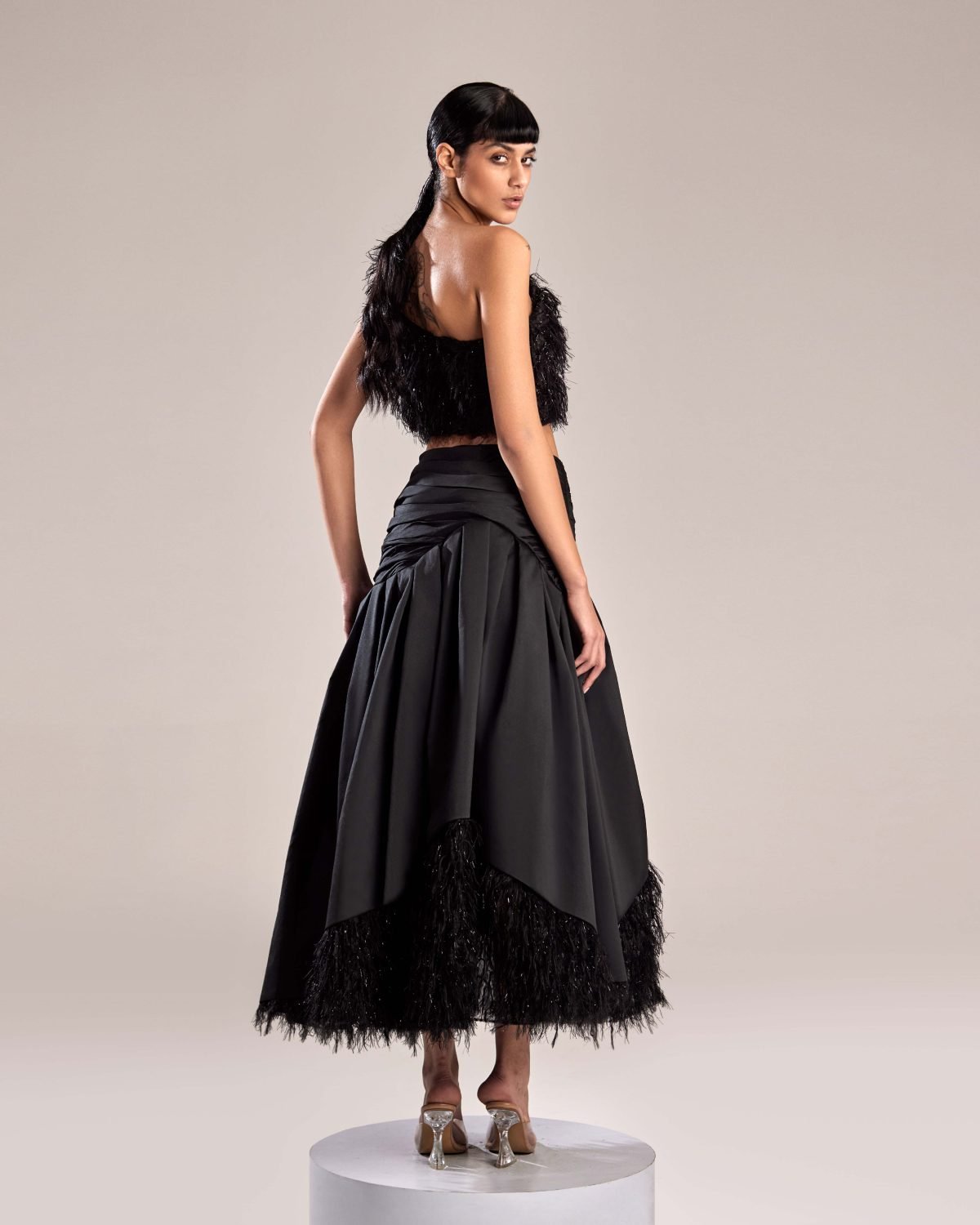 Black Feathered Fabric One-Shoulder Top for Bold Elegance