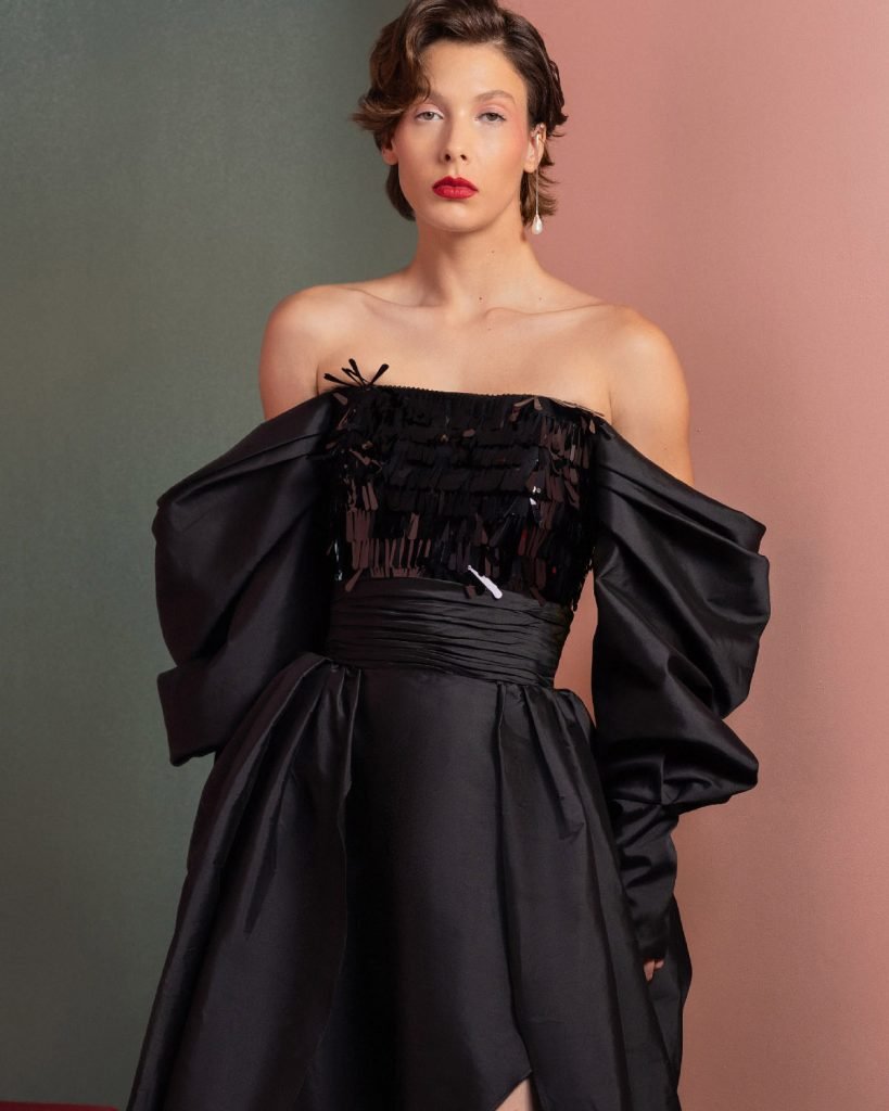 Bold sleek Sequin Top with Exaggerated Glamour Sleeves 