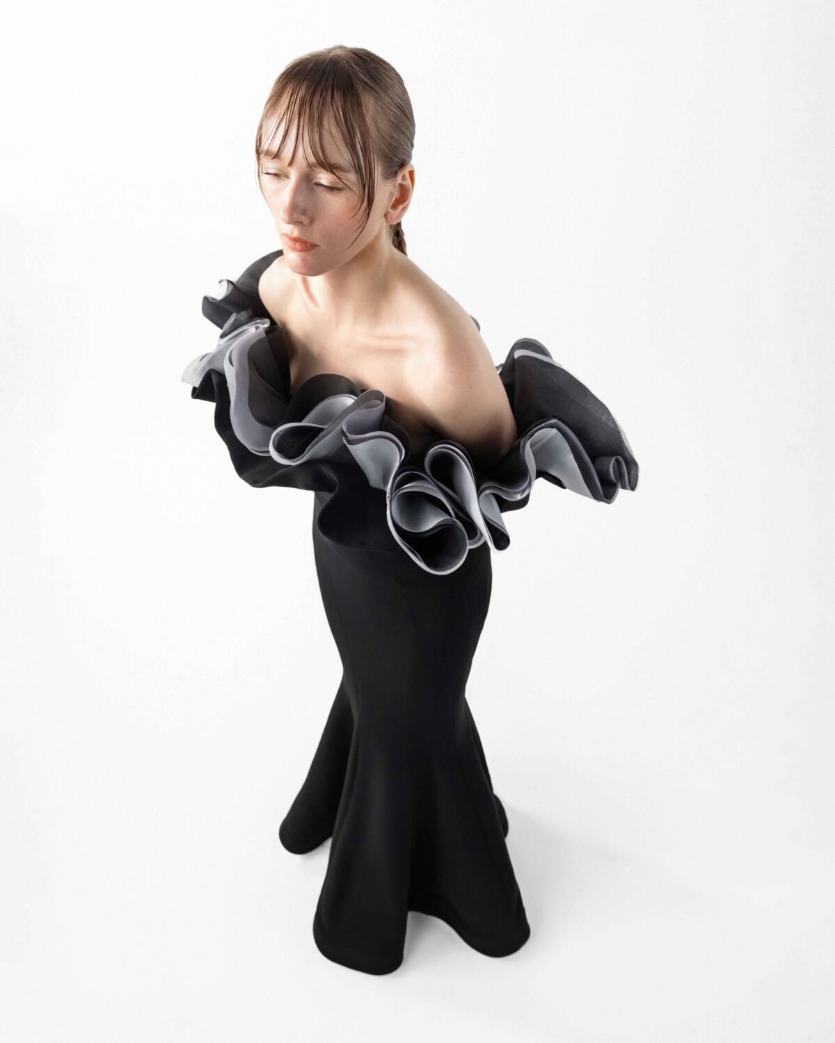Romantic Black Gown with Sculptural Ruffles and Sleeves