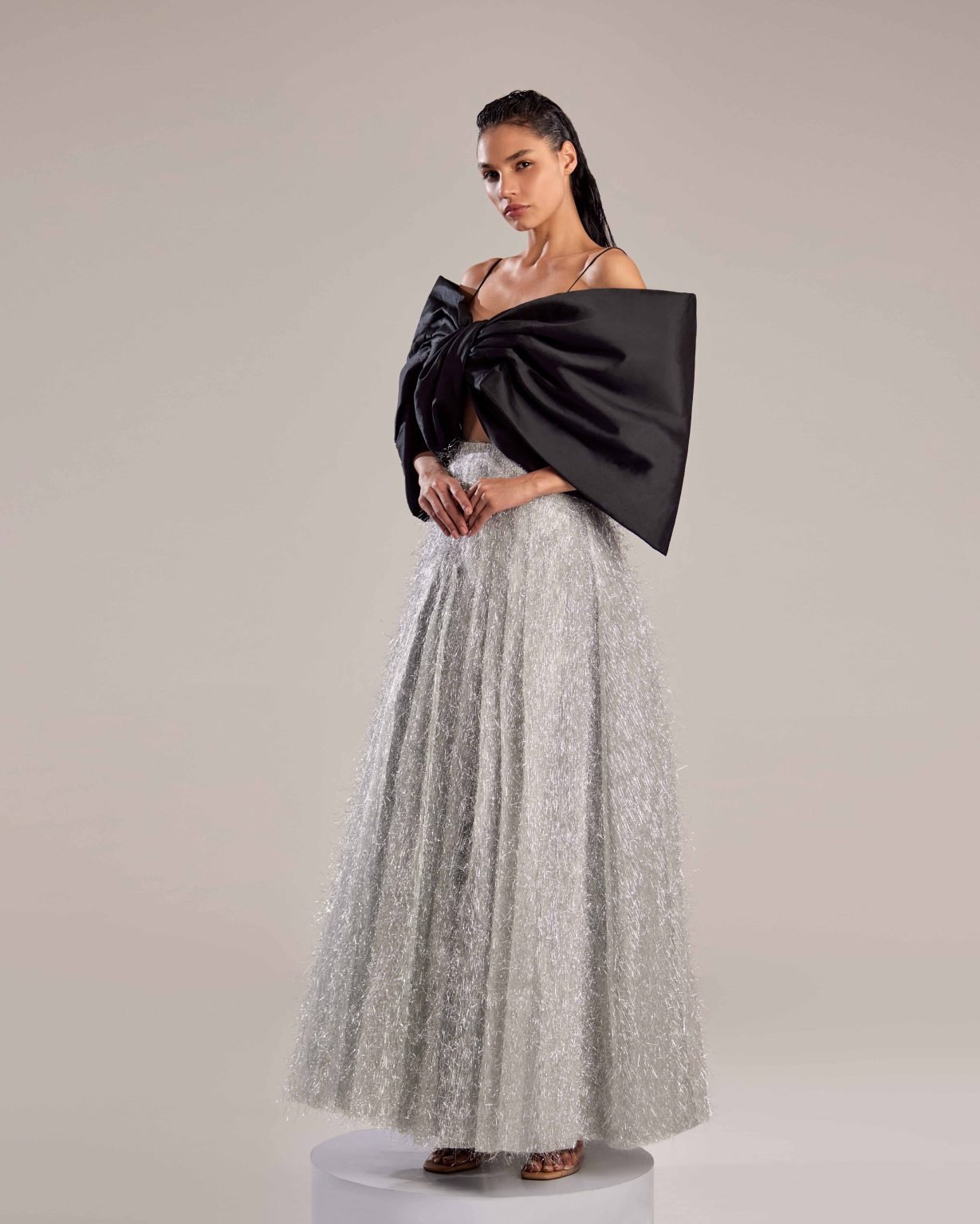 Elegant Silver Feathered Dress with Black Bow