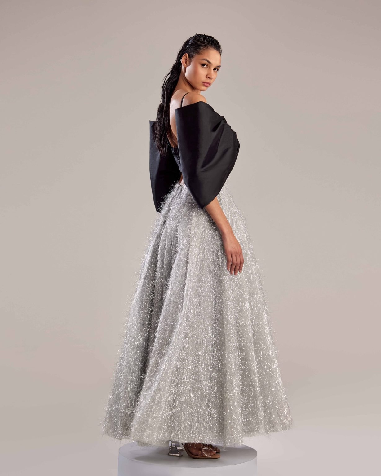 Elegant Silver Feathered Dress with Black Bow