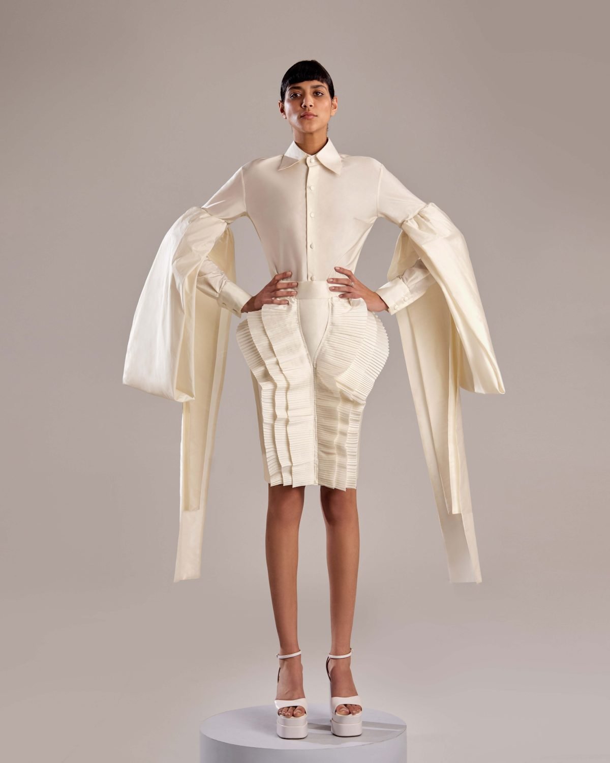 Luxurious White Taffeta Top with Unique Long-Sleeve Drapes