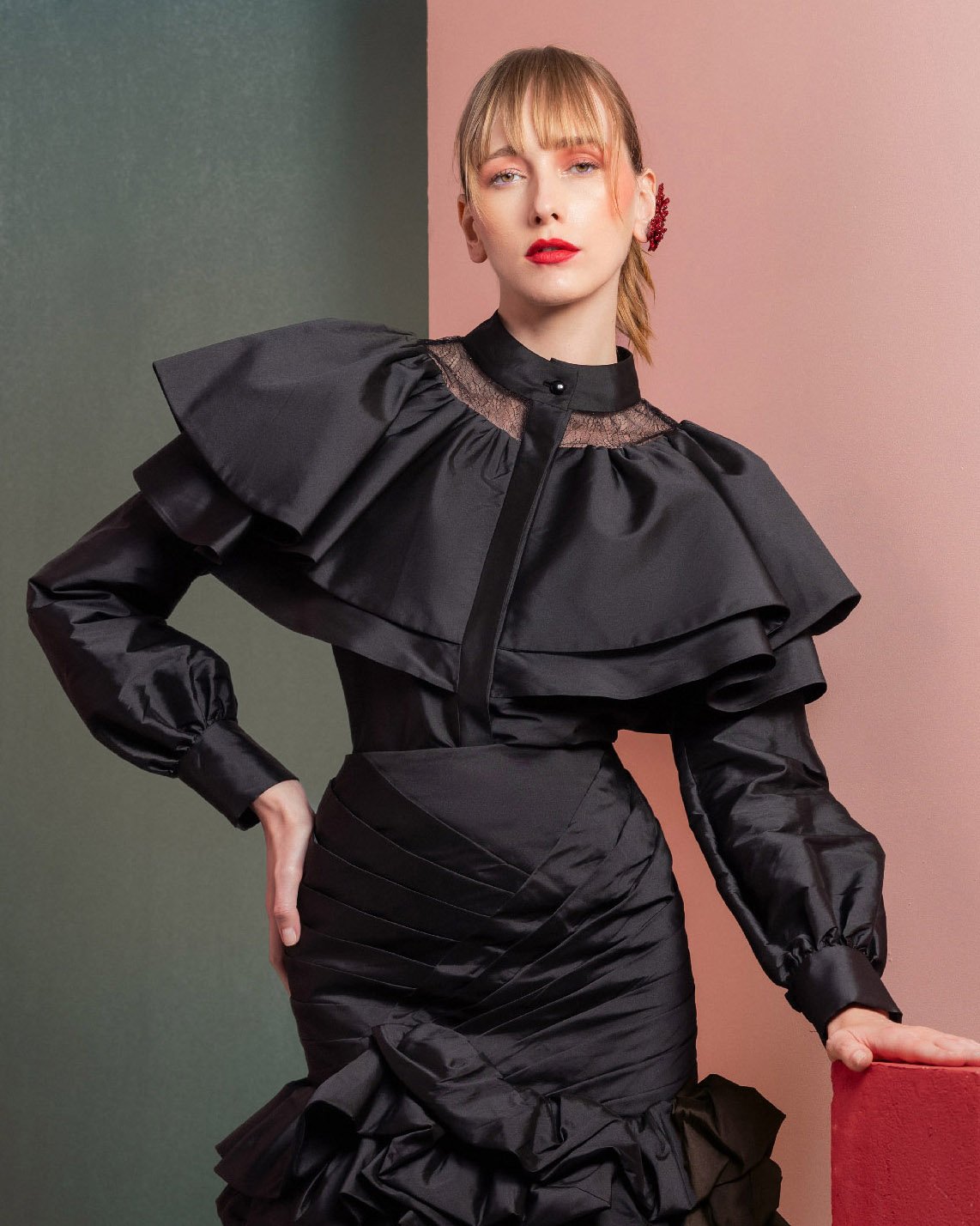 Dramatic Ruffled Blouse with Sheer Accents