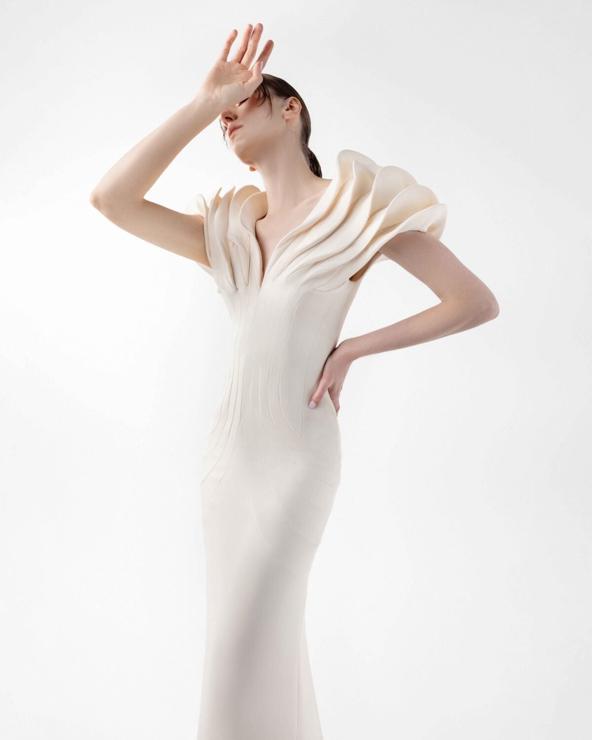Cream Crepe Gown with Architectural Sleeves and Sculpted Lines