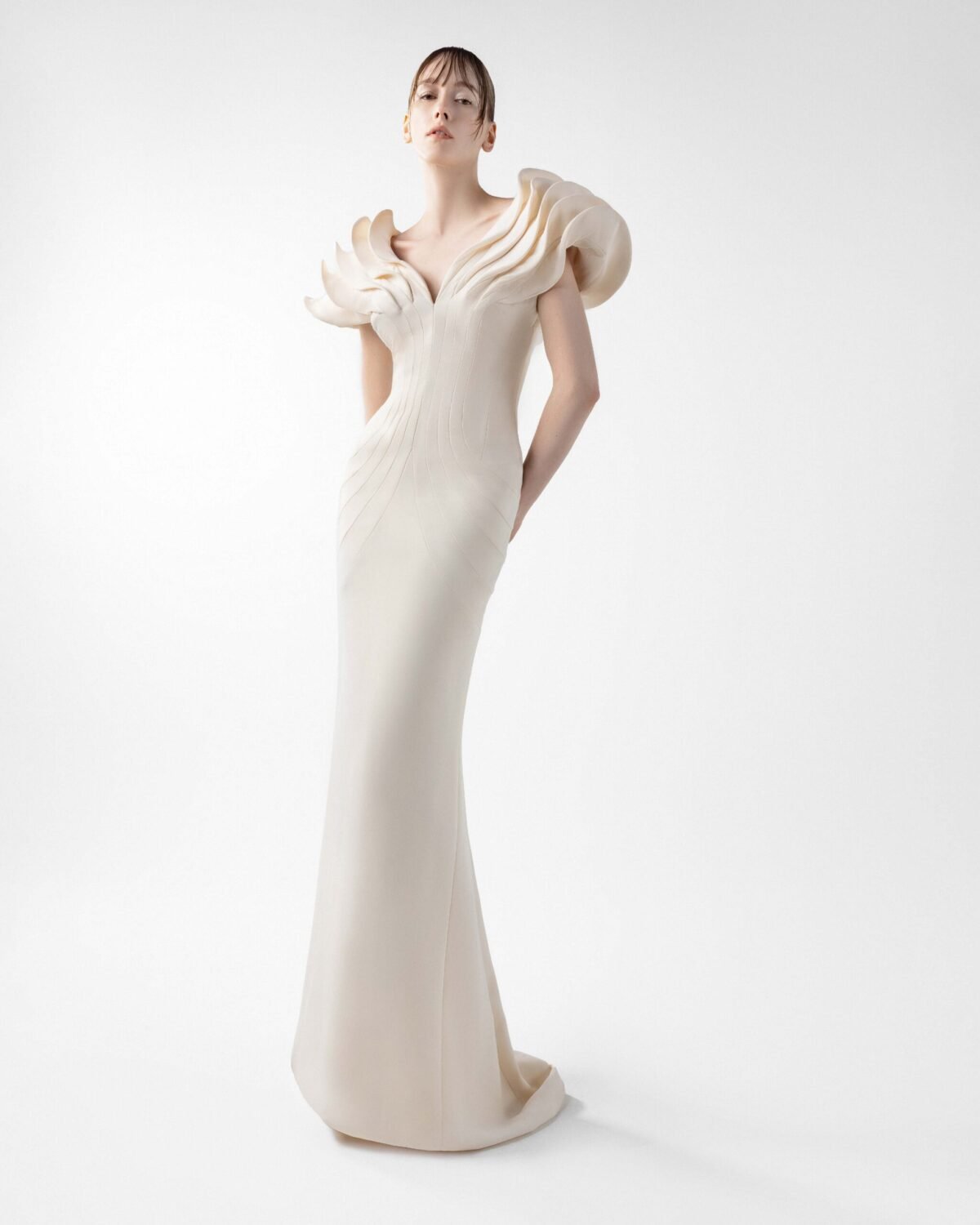 Cream Crepe Gown with Architectural Sleeves and Sculpted Lines