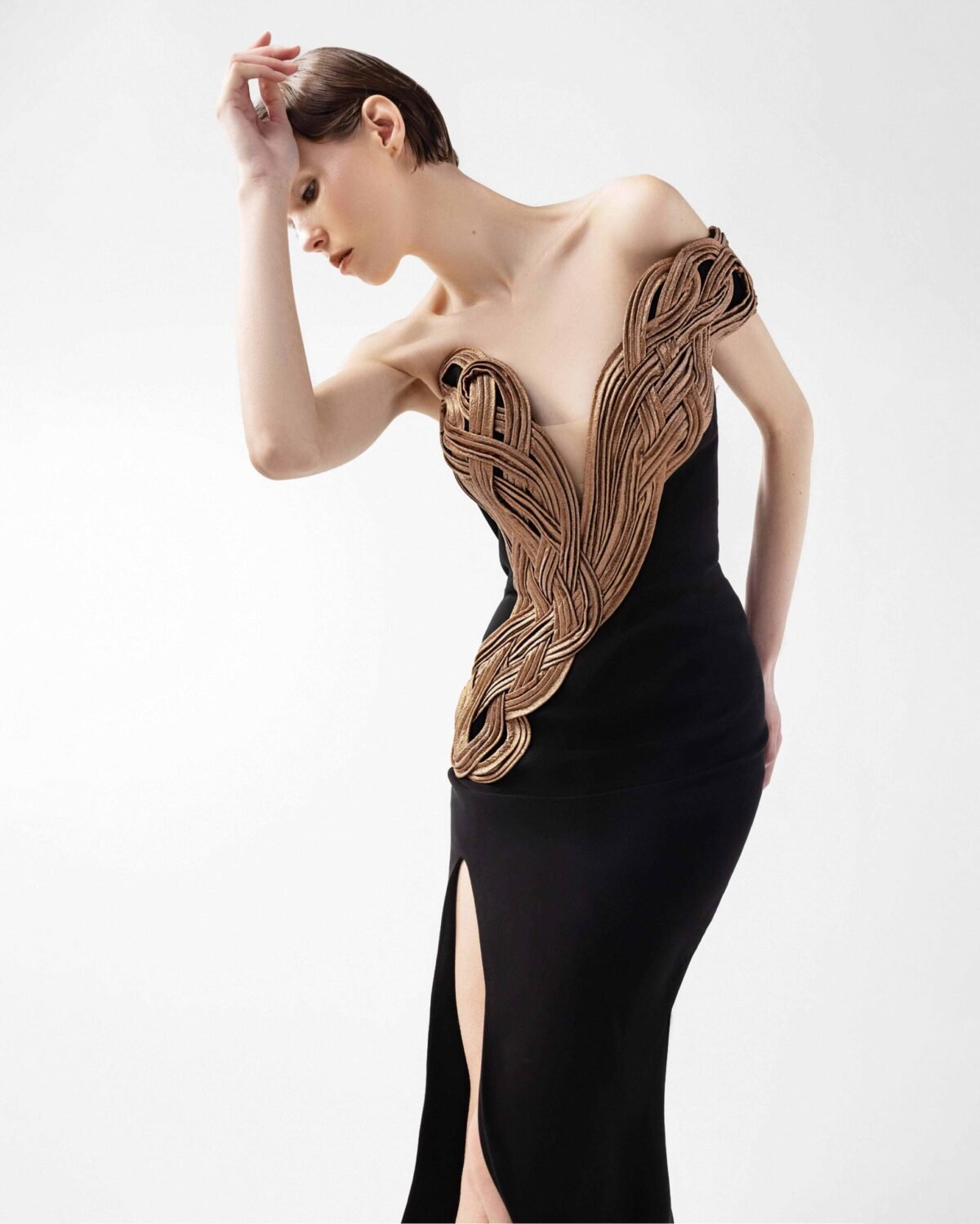 Midnight Noir Gown with Sculptural Bronze Twist and Side Slit