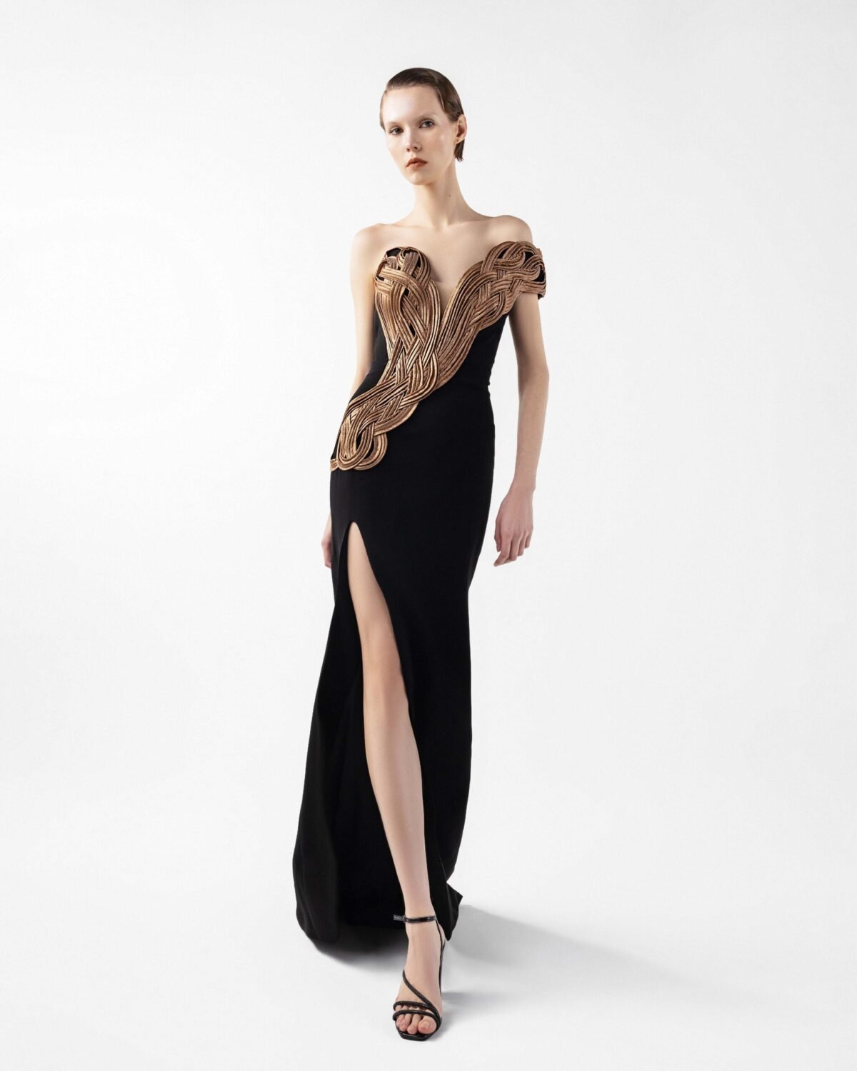 Midnight Noir Gown with Sculptural Bronze Twist and Side Slit