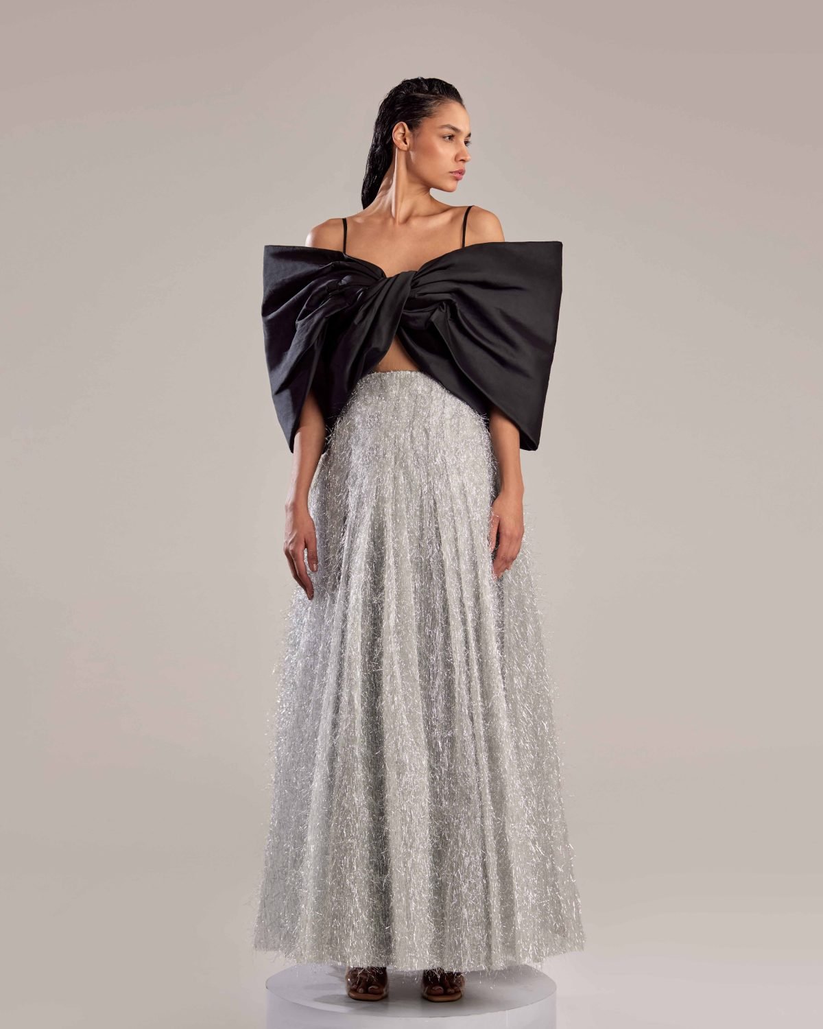 Elegant Silver Feathered Dress with Black Bow