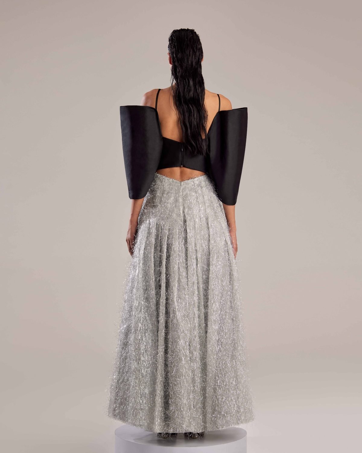 Elegant Silver Feathered Dress with Black Bow