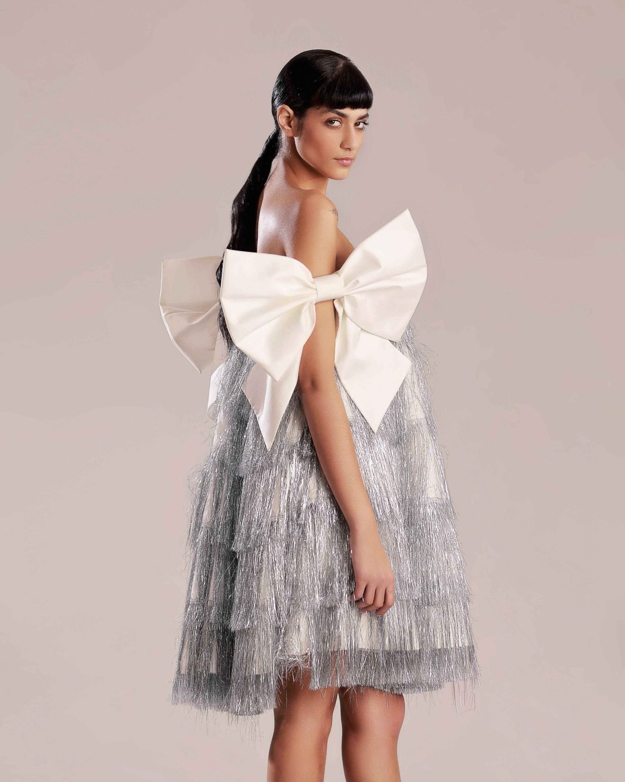 Whimsical Silver Feathered Dress with White Taffeta Bow Ties