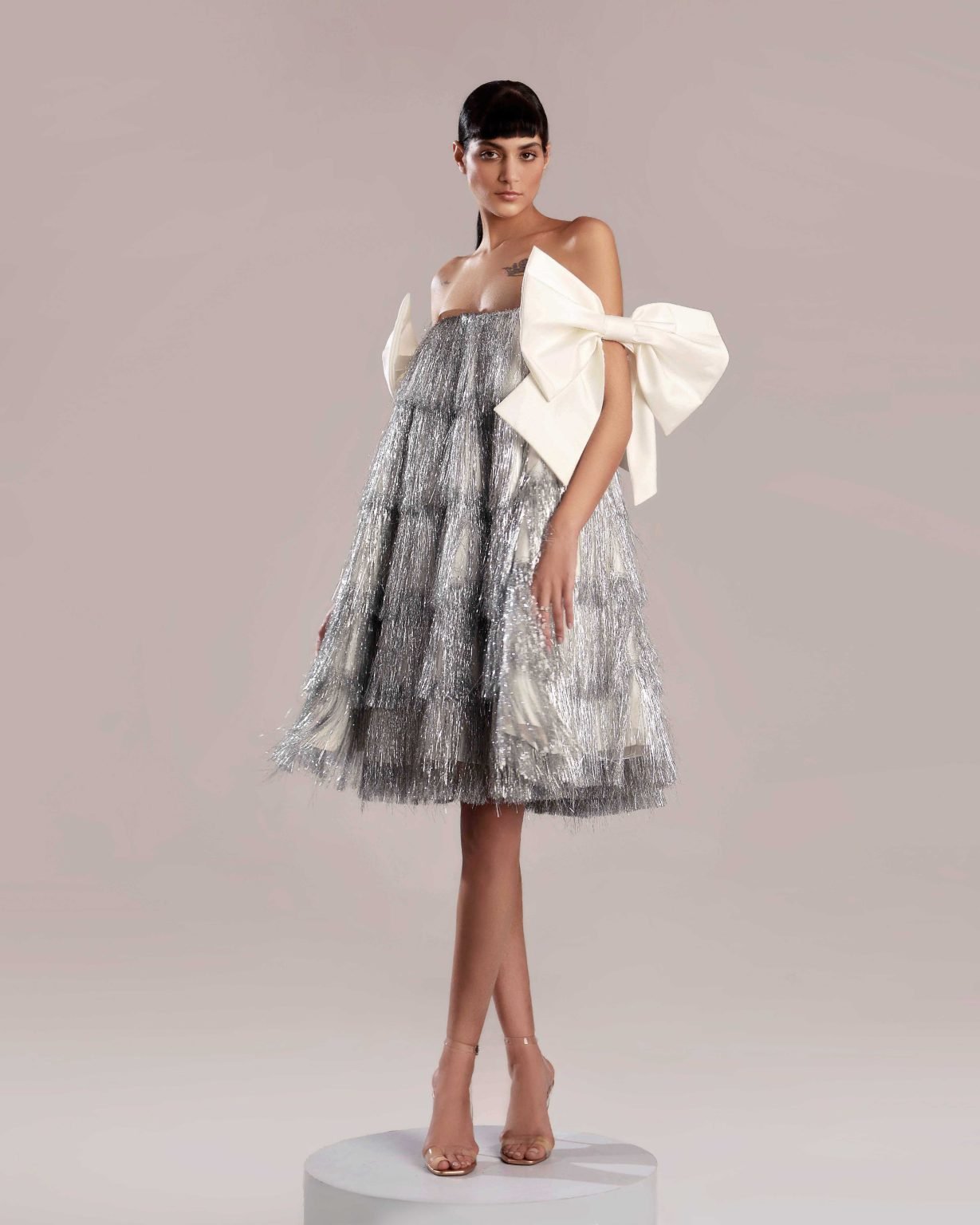 Whimsical Silver Feathered Dress with White Taffeta Bow Ties
