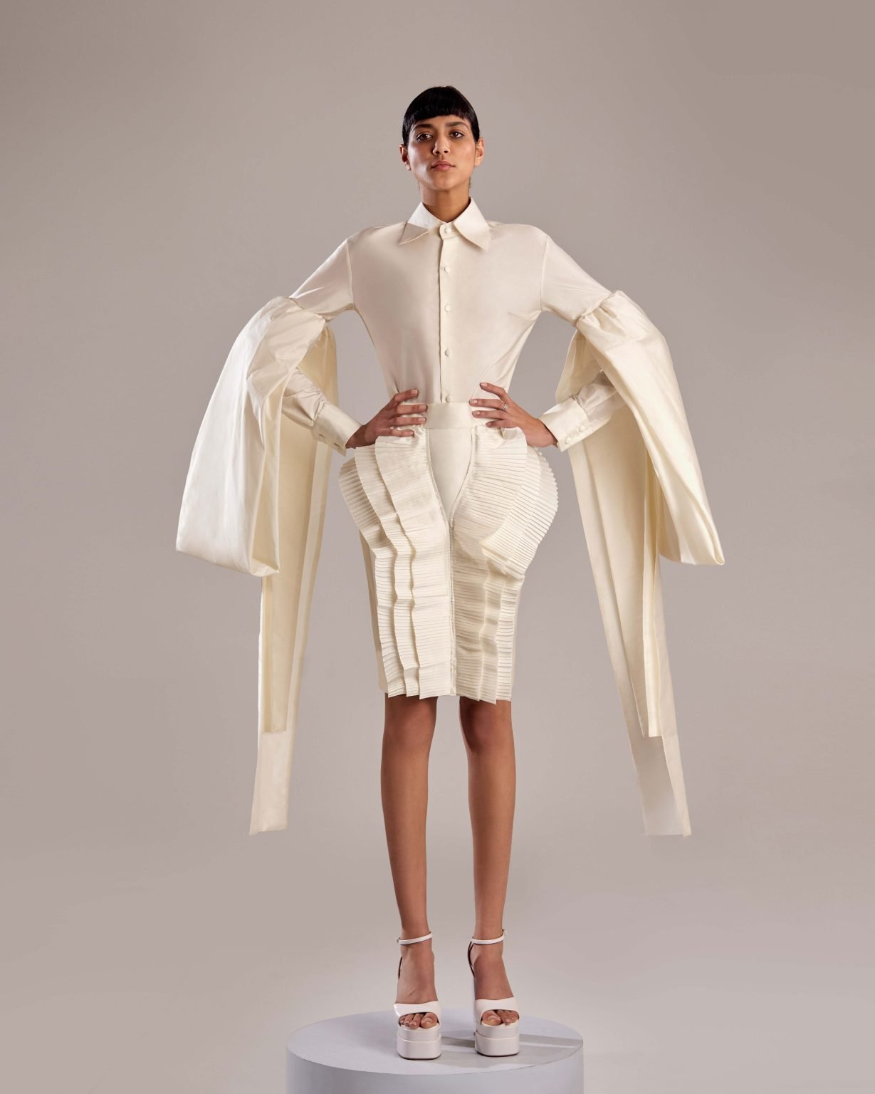 Luxurious White Taffeta Top with Unique Long-Sleeve Drapes