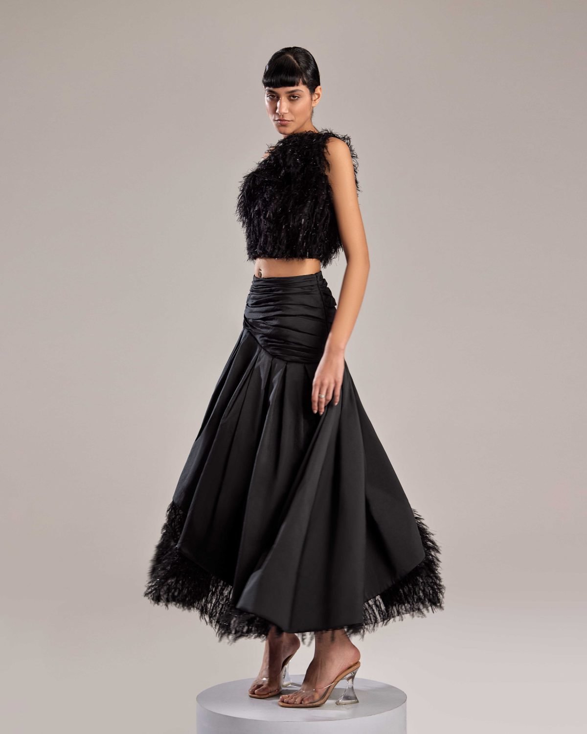 Black Feathered Fabric One-Shoulder Top for Bold Elegance