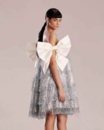 Whimsical Silver Feathered Dress with White Taffeta Bow Ties - Image 2